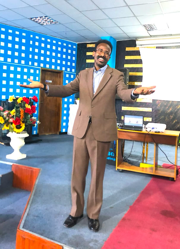 Rev. Dr. Aweis A. Ali giving a speech